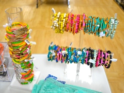 A beaucoup bunch of beaded bracelets.